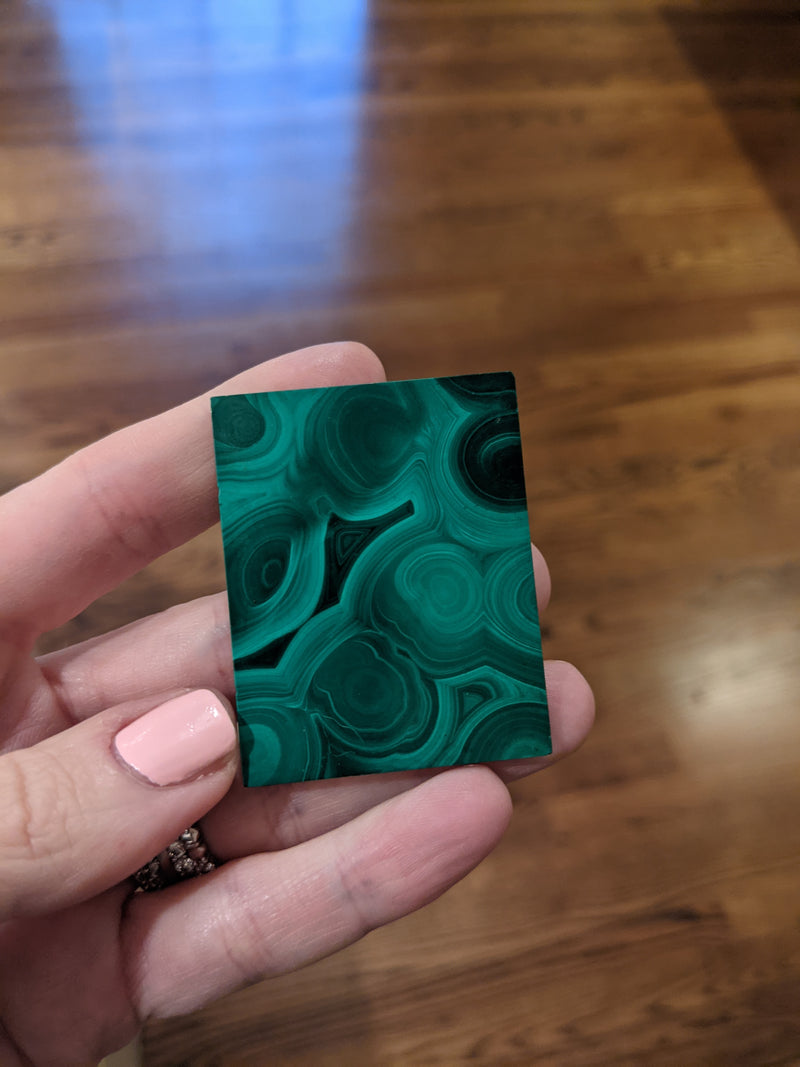 This is her grandfather's malachite box that we used to make her pendant.