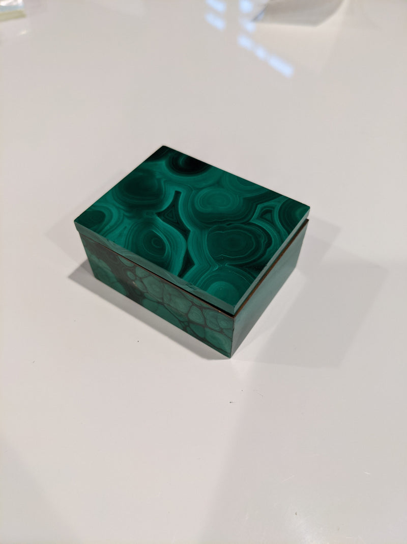 This is her grandfather's malachite box that we used to make her pendant.