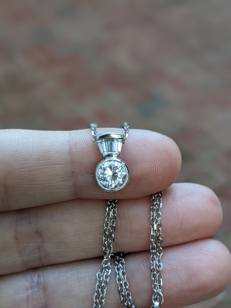 We used the diamond baguettes from this client's pendant necklace in the ring.