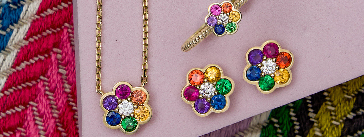 Rainbow Blooms necklace, ring and earrings with rainbow sapphire flowers in 14k yellow gold