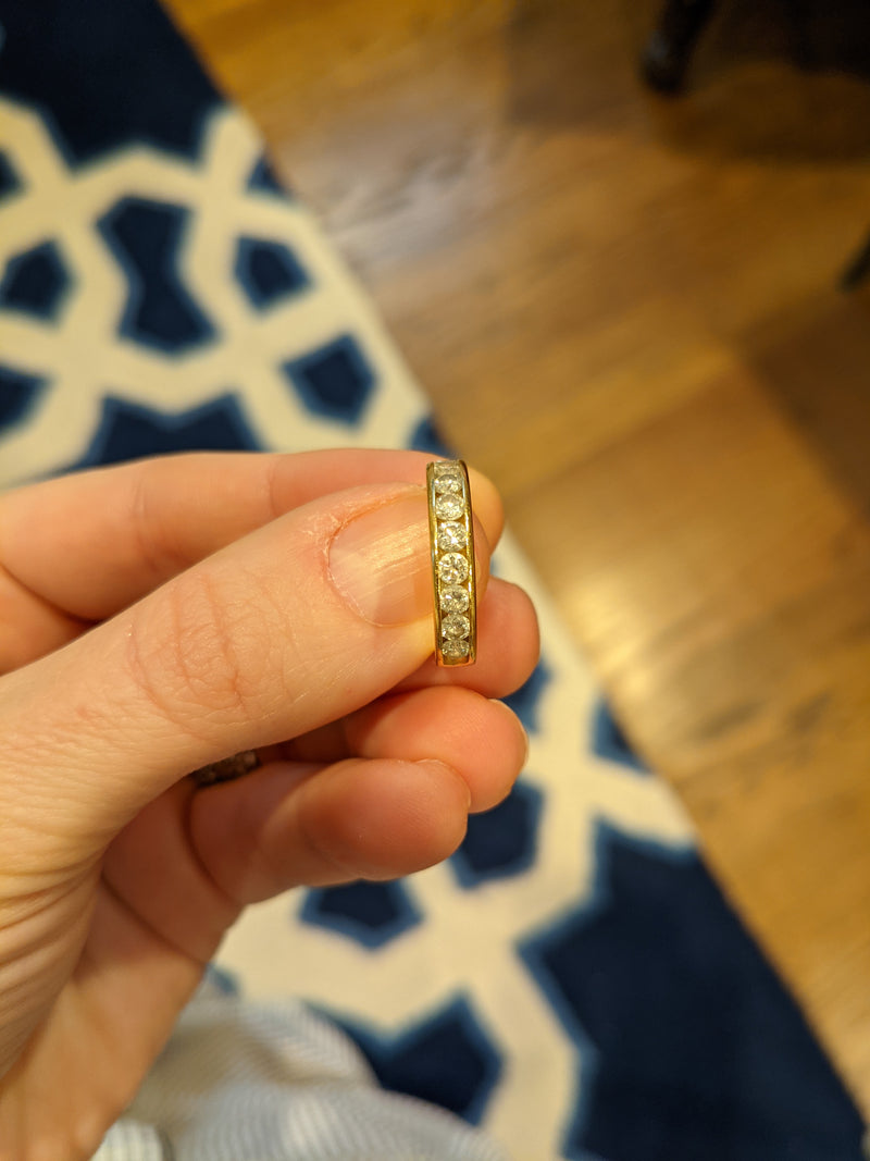 The diamonds in her custom piece came from this eternity band she inherited.