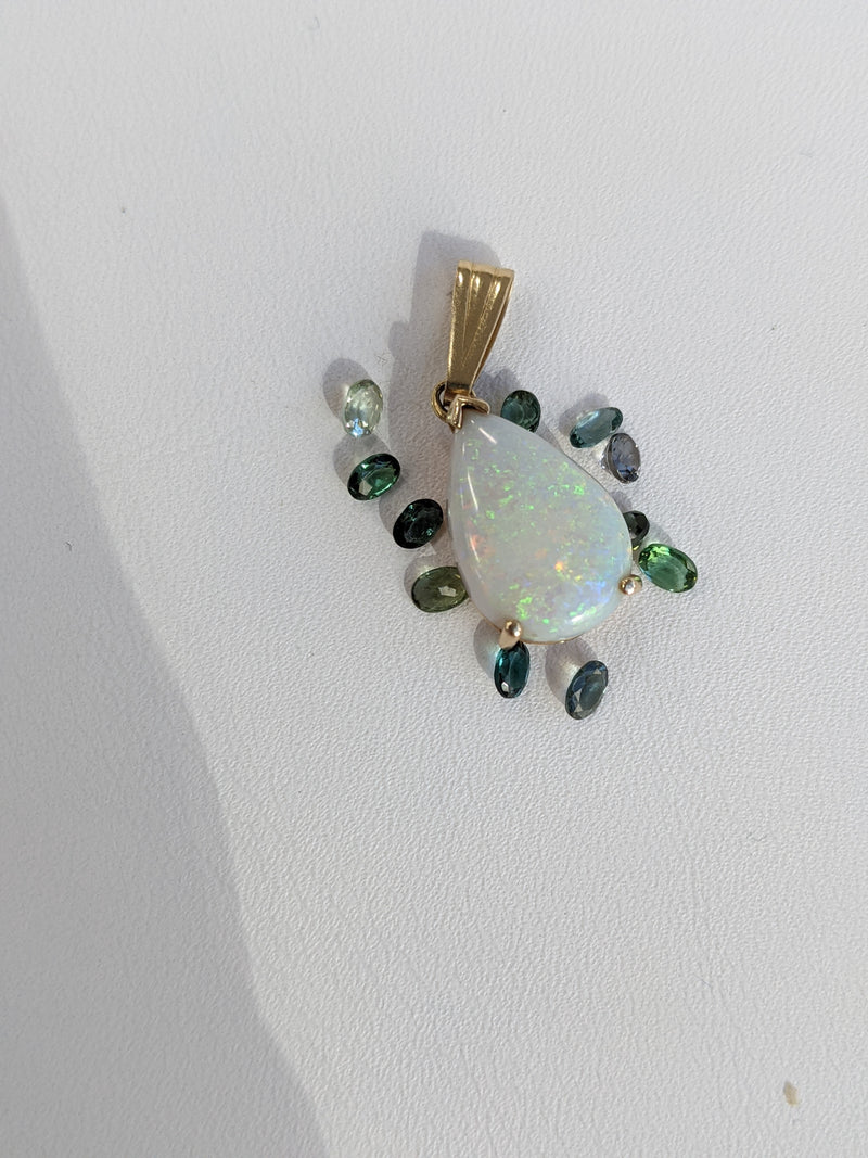 Here are the blue/green tourmalines we chose for the pendant halo.