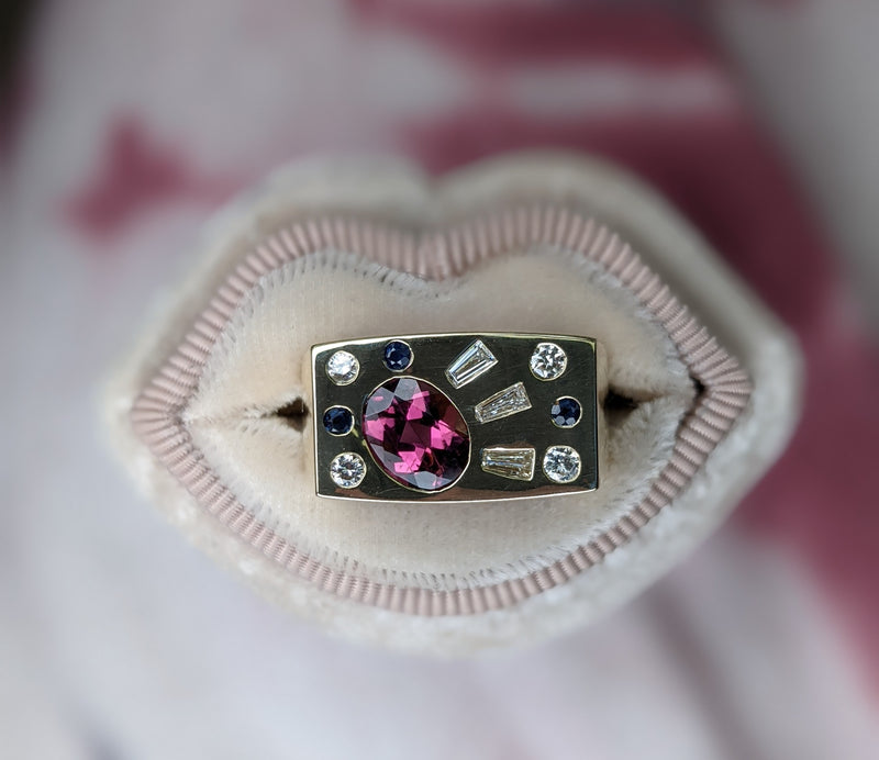 A bespoke memento ring using heirloom pieces & originally sourced stones