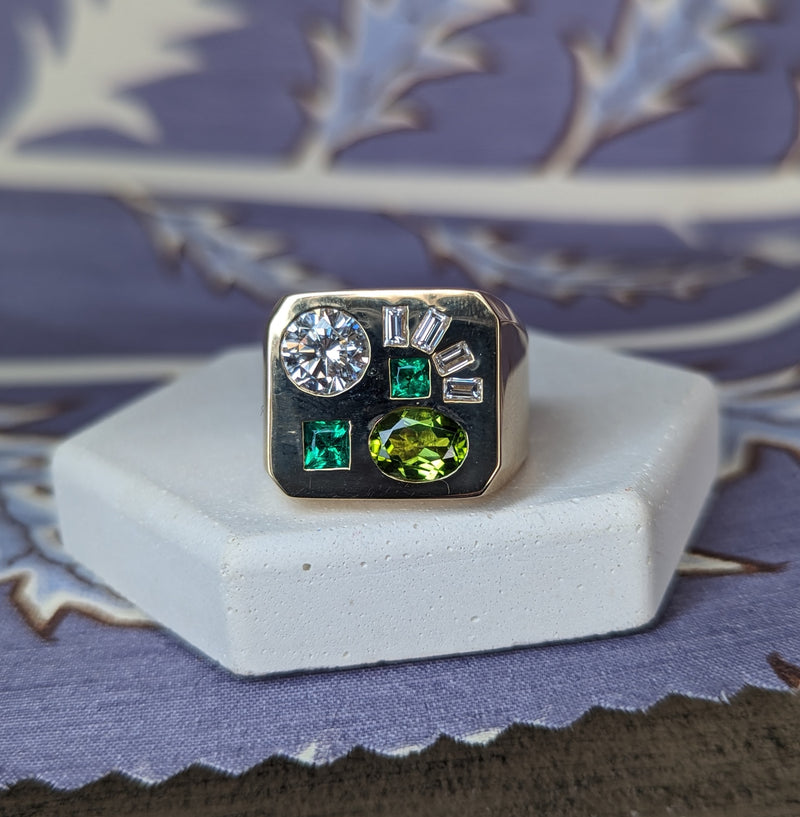 A bespoke memento ring combining several heirloom pieces