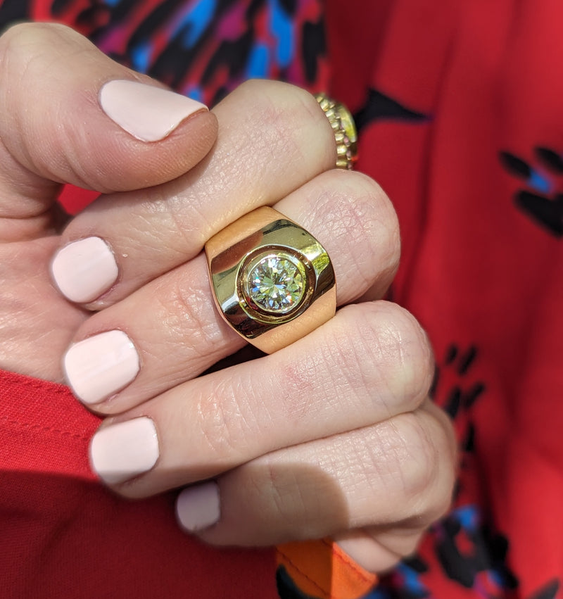An heirloom diamond transformed into a modern cigar band ring