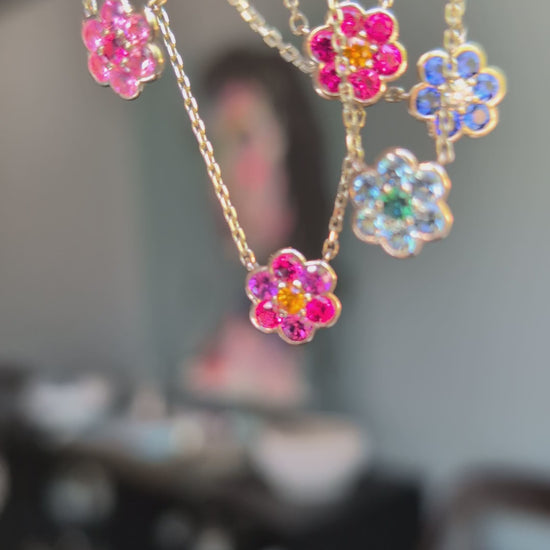 Video of five Small Blooms Pendant Necklaces in spinel, garnet, sapphire, aquamarine and tourmaline