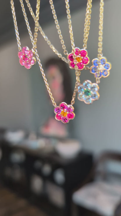 Video of five Small Blooms Pendant Necklaces in spinel, garnet, sapphire, aquamarine and tourmaline