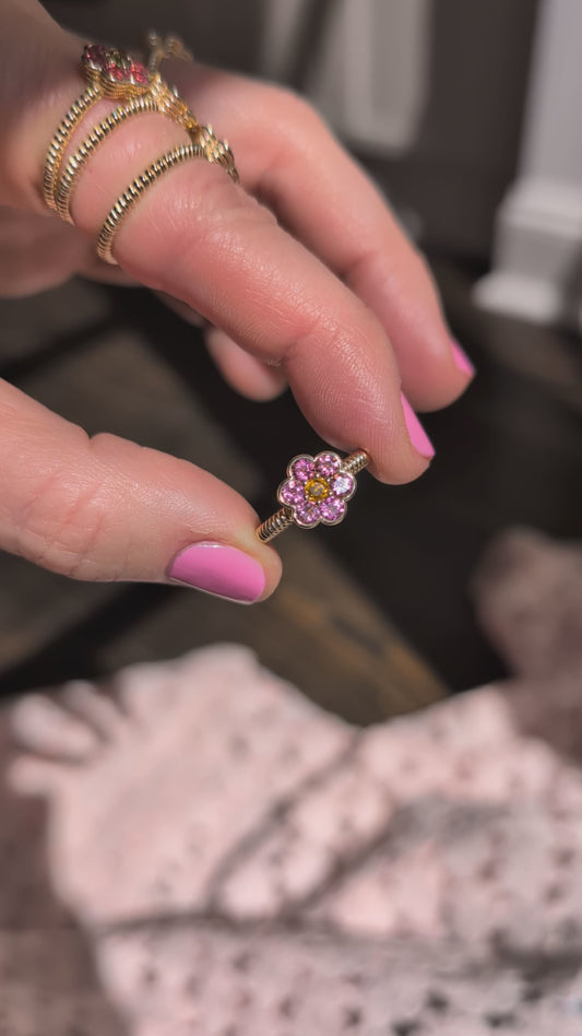 Video of the Blooms Medium Ring in pink tourmaline and citrine held in sunlight
